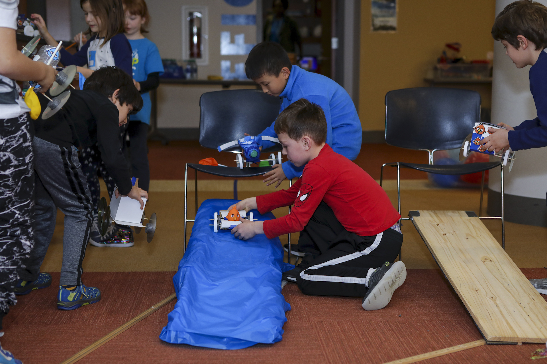 Kids testing their transportation devices