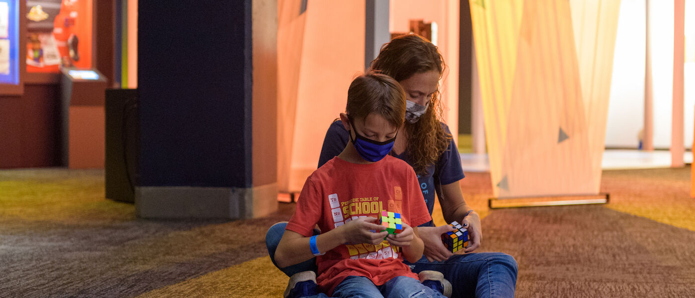 Family with Rubik's Cubes