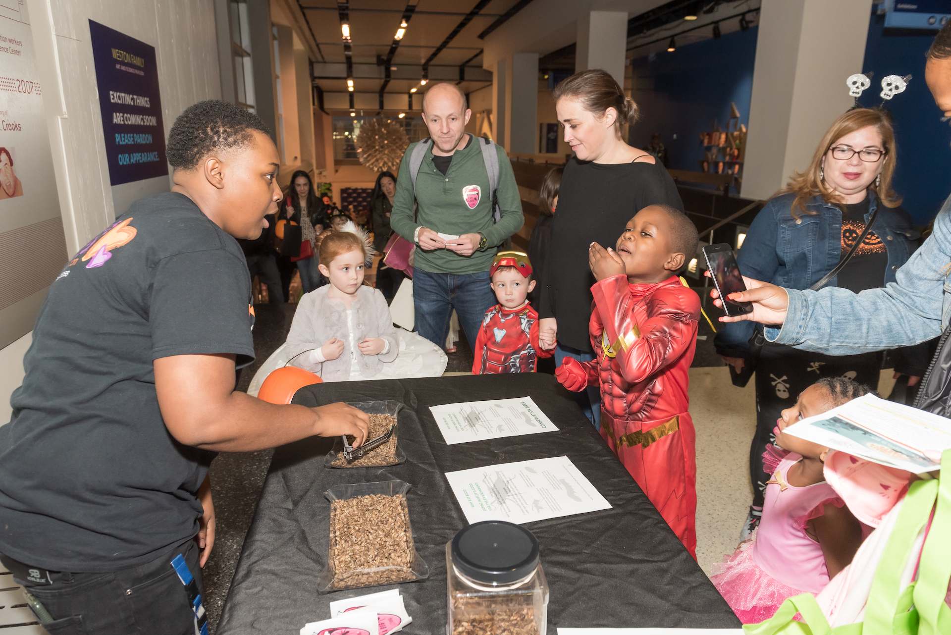 Guests eating bugs at the Bug Buffet