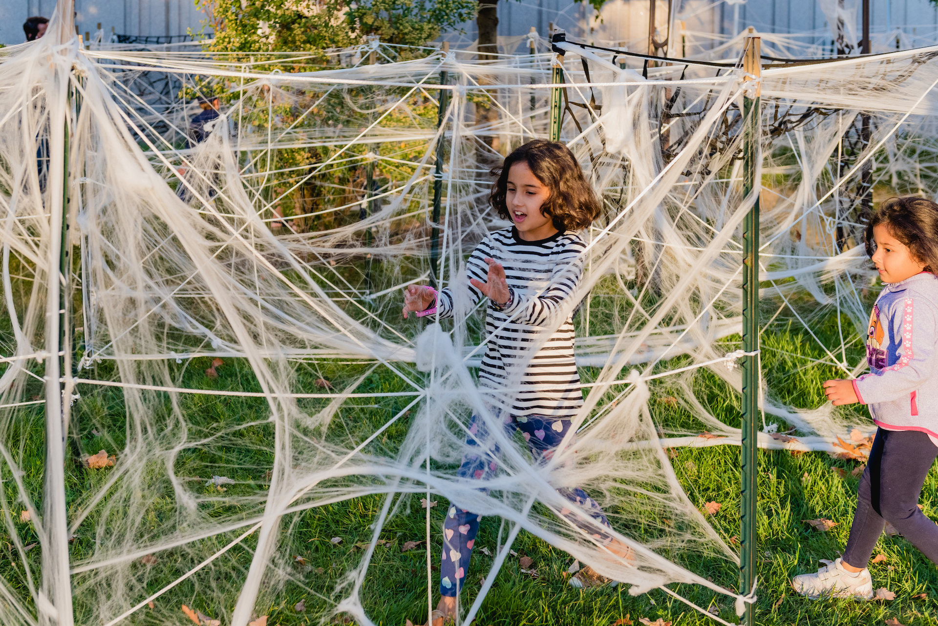 Girl exploring Spider Maze