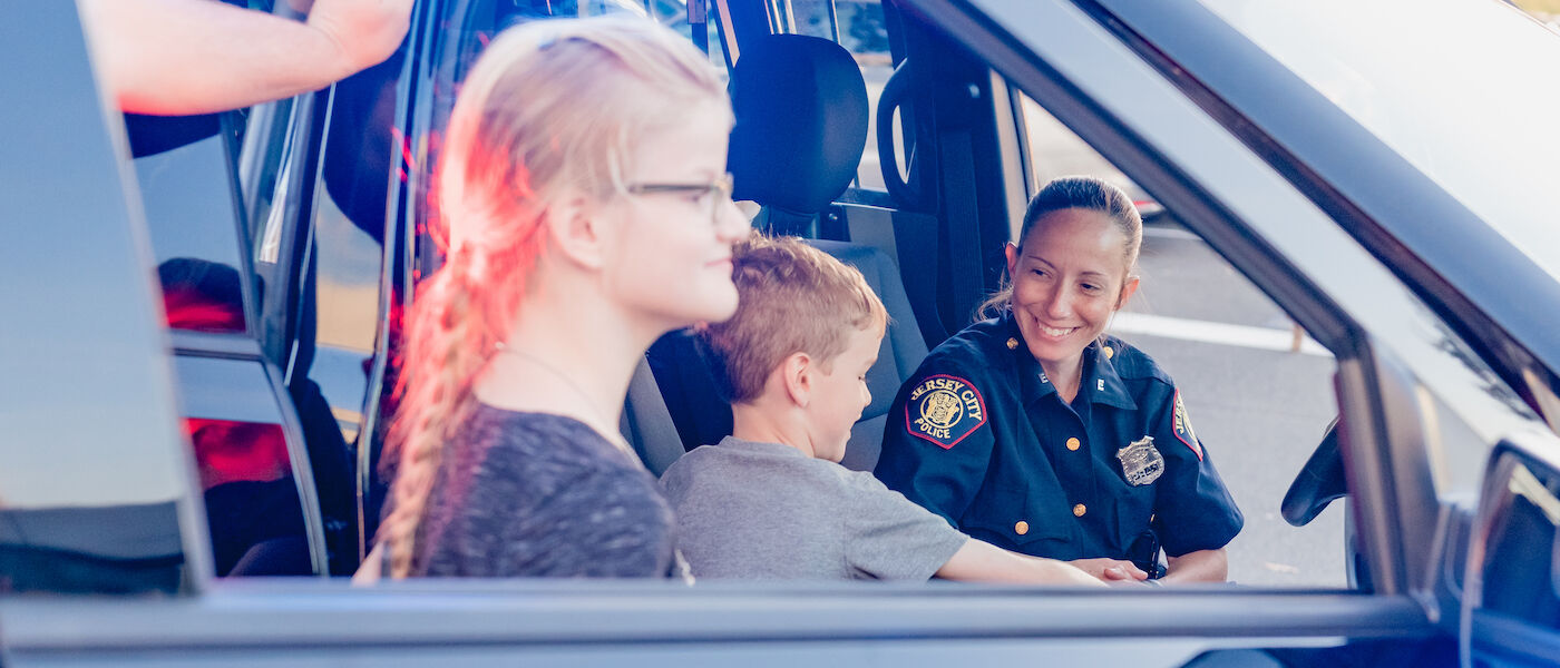 Kids in cop car