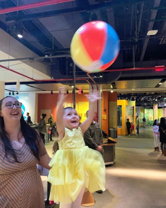 12 Days of Science photo contest runner-up (girl tossing ball in air)