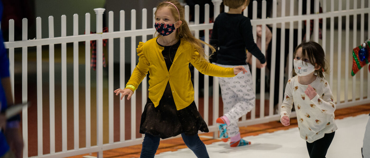 Kids having fun on the Sock Skating Rink